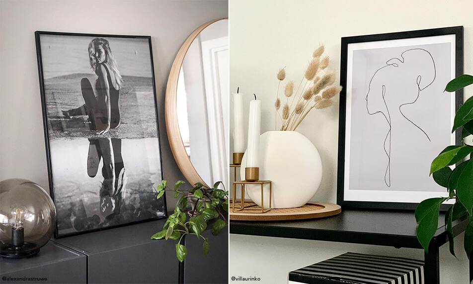 Letisztult berendezés fekete képkeretekkel és zöld növényekkel